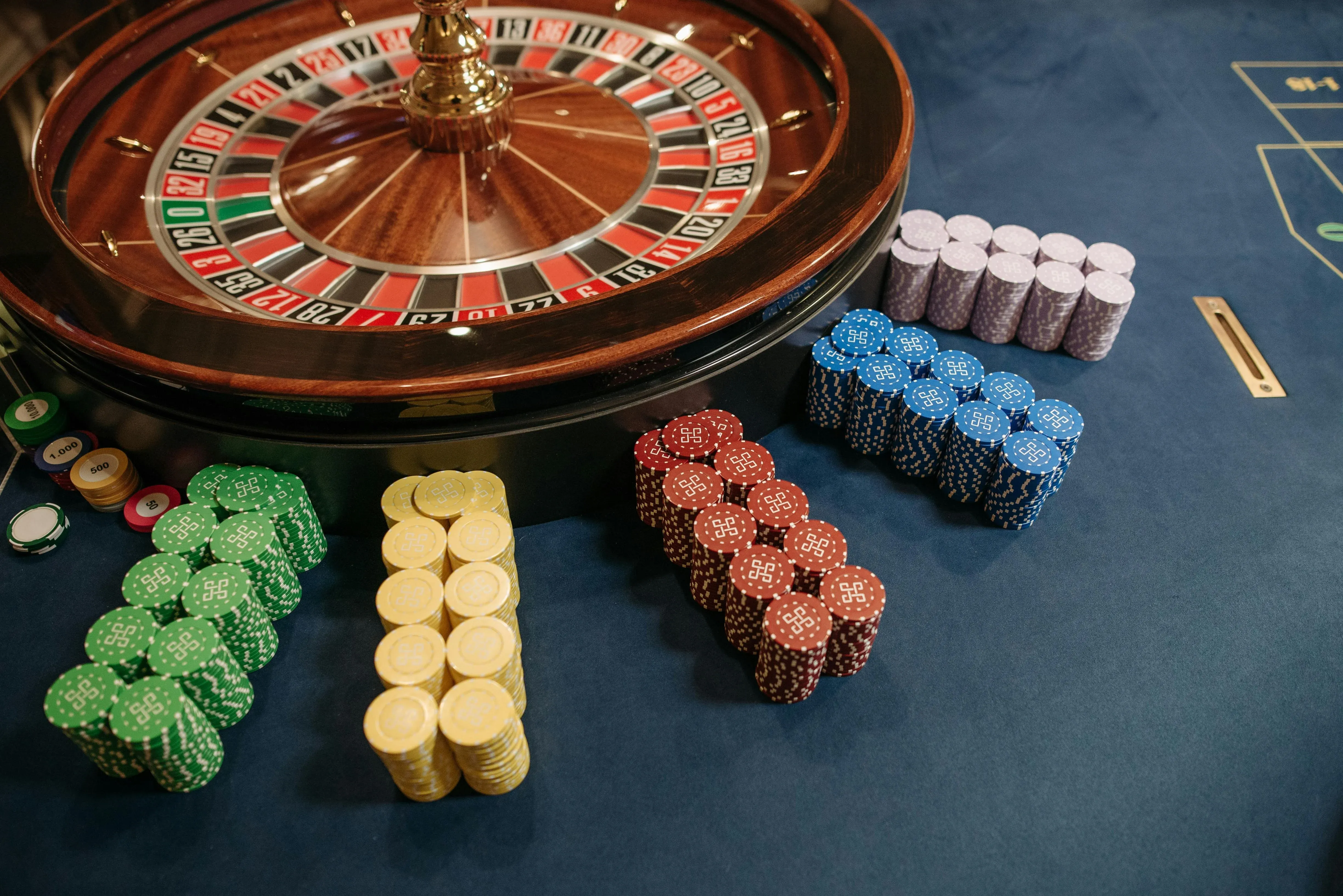 Roulette wheel on green table